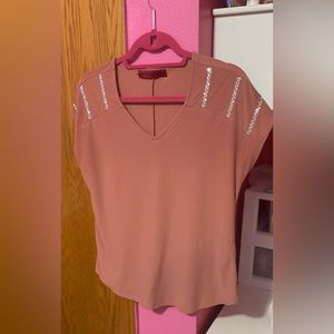 EUC. Dusty pink top with embellishment. Size small. Semi sheer.